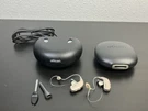 Oticon More 2 Rechargeable Hearing Aids Right Left ,charger - And New Batteries. Fixed Price $450.00.