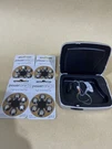 2) Resound 202-LSB- 069 Hearing Aid, W/ Case And Batteries Gray Black. Fixed Price $275.00.