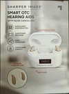 Sharper Image SI-ARER-950 Smart Otc Hearing Aids Noise Cancelling New. Fixed Price $29.99.