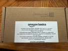 Amazon Basics 60 Pack Hearing Aid Size 312 Batteries, 1.45 Volt, Brown Unopened. Fixed Price $15.00.