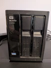 My Cloud EX2100 2-BAY Nas WDBWAZ0080JBK-20 No Drives + Power Adapter. Fixed Price $125.00.