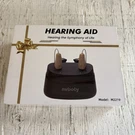 Nvboty M2219 Rechargeable Hearing Aid - W/ 4 Sizes/sets Of Silicone Pieces. Fixed Price $60.00.