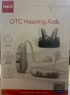 New Sealed Rca Otc Behind-the-ear Hearing Aid With Recharging Stand Left/right. Fixed Price $35.00.