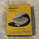 Audien Hearing Atom One Rechargeable In-ear Aid W/ Charging Dock. Fixed Price $70.00.