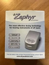 Zephyr By & Store Hearing Aid Dryer Moisture Remover Open Box. Fixed Price $15.99.