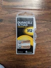 6 Duracell Hearing Aid Batteries Size 312. Fixed Price $12.00.