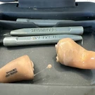 Siemens Hearing Aids W/case... Pre-owned Right & Left With Damage. Fixed Price $100.00.